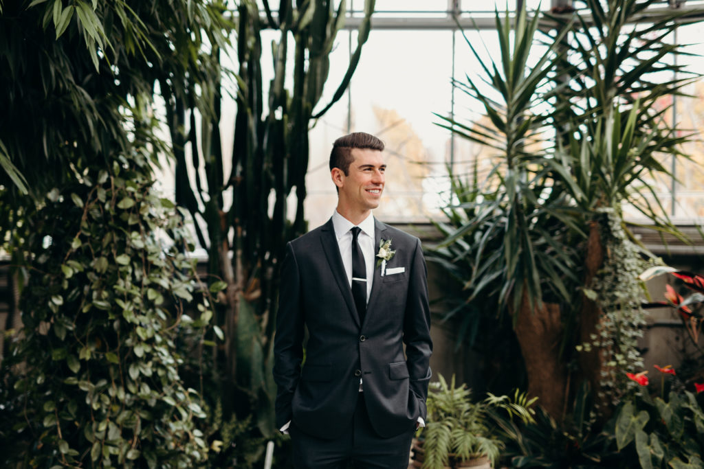 groom at civic gardens wedding in london, ontario flowers by grow and bloom